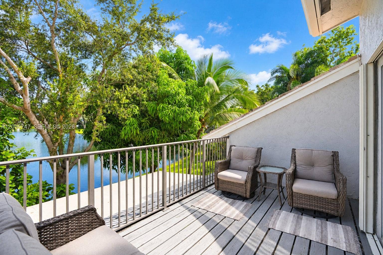 3237 Deer Creek Lake Shore Drive, Deerfield Beach, FL 33442 Patio off of primary bedroom