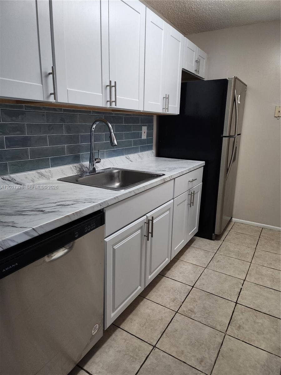 Property photo for 1201 Lake Victoria Drive, #F, West Palm Beach, FL