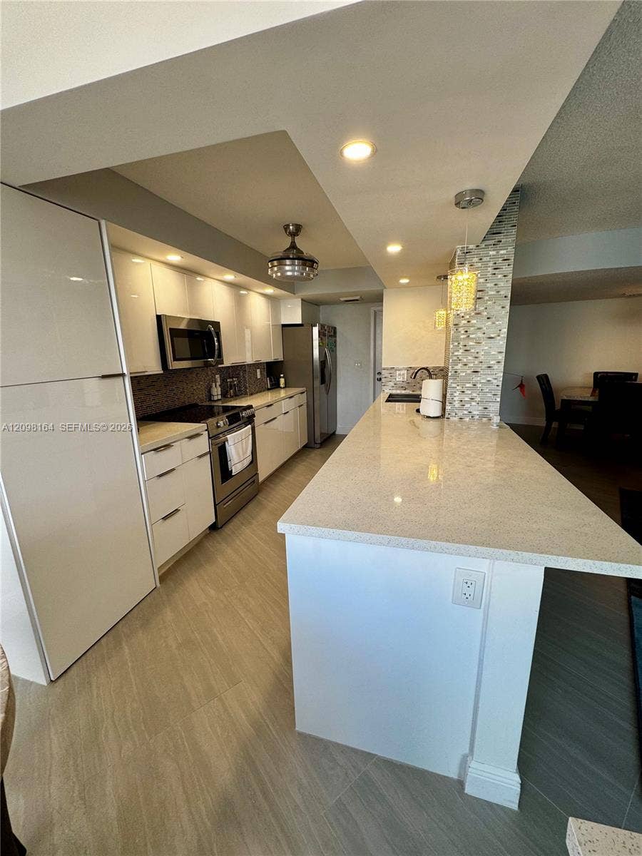 Property photo for 100 Golden Isles Drive, #205, Hallandale Beach, FL