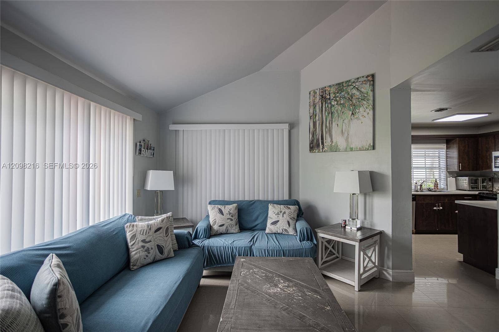 Open living area that flows into the kitchen, made for easy everyday living and entertaining.