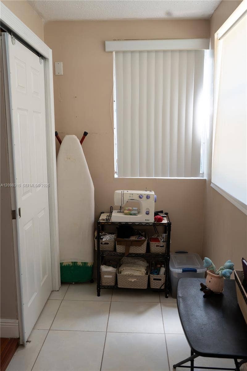 11113 NW 7th Street, #105-1, Miami, FL 33172 extra space in master bedroom for office, hobby room, etc.