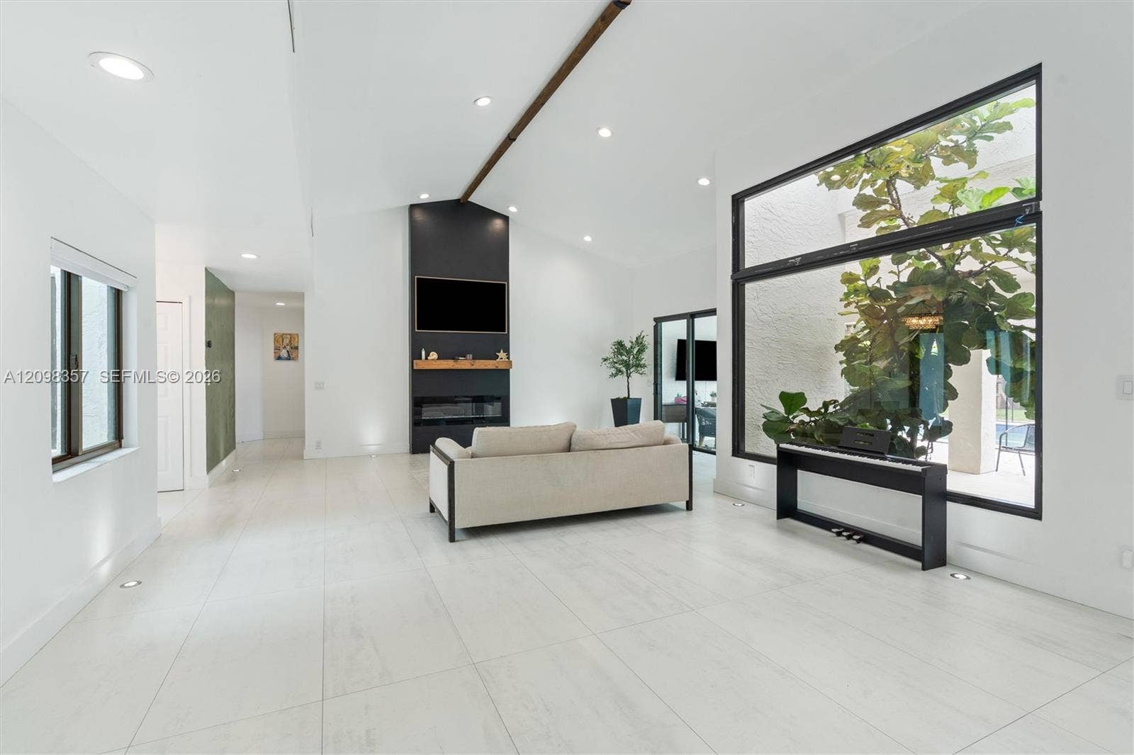 Beautiful Large Impact Window Centers the Home