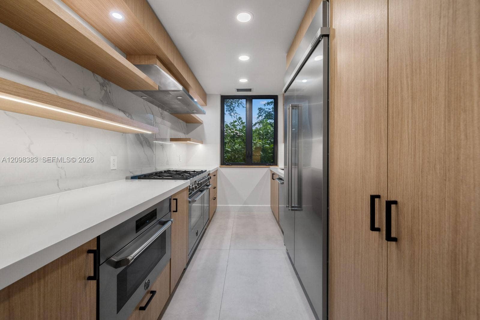 Fully equipped secondary chefs kitchen with Bertazzoni appliances at 2965 Surrey Lane, Weston Florida.