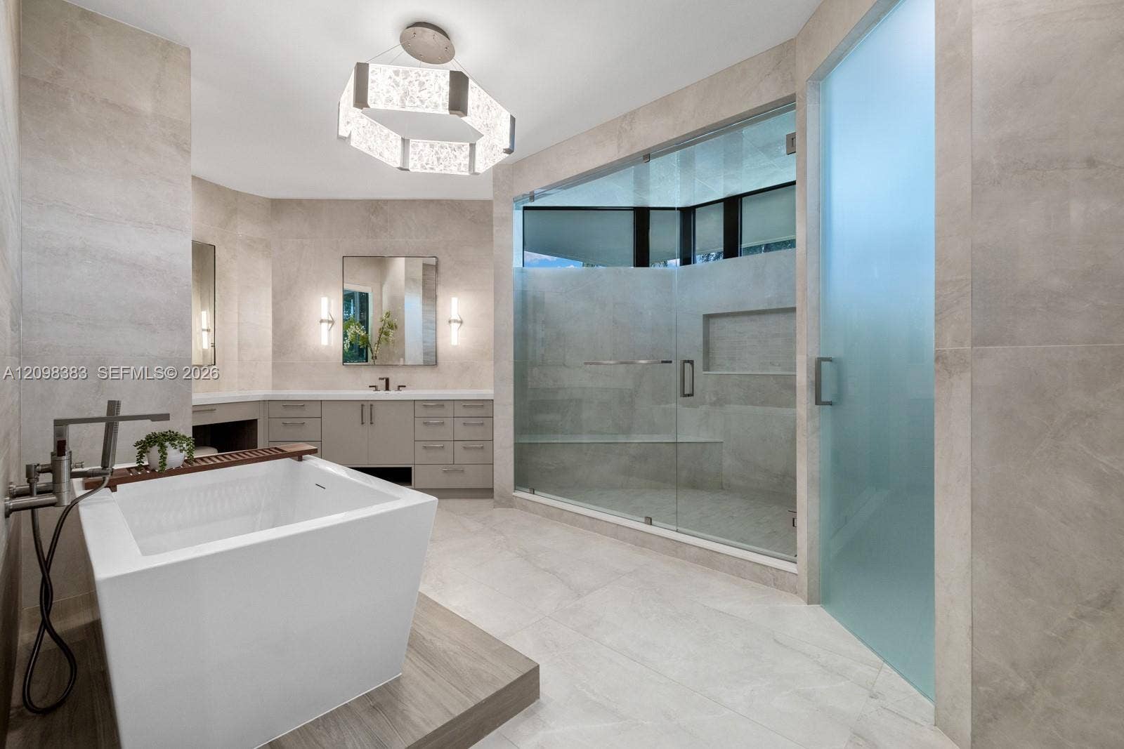Separate primary bathrooms designed as private spa retreats at 2965 Surrey Lane in Windmill Ranch Estates.