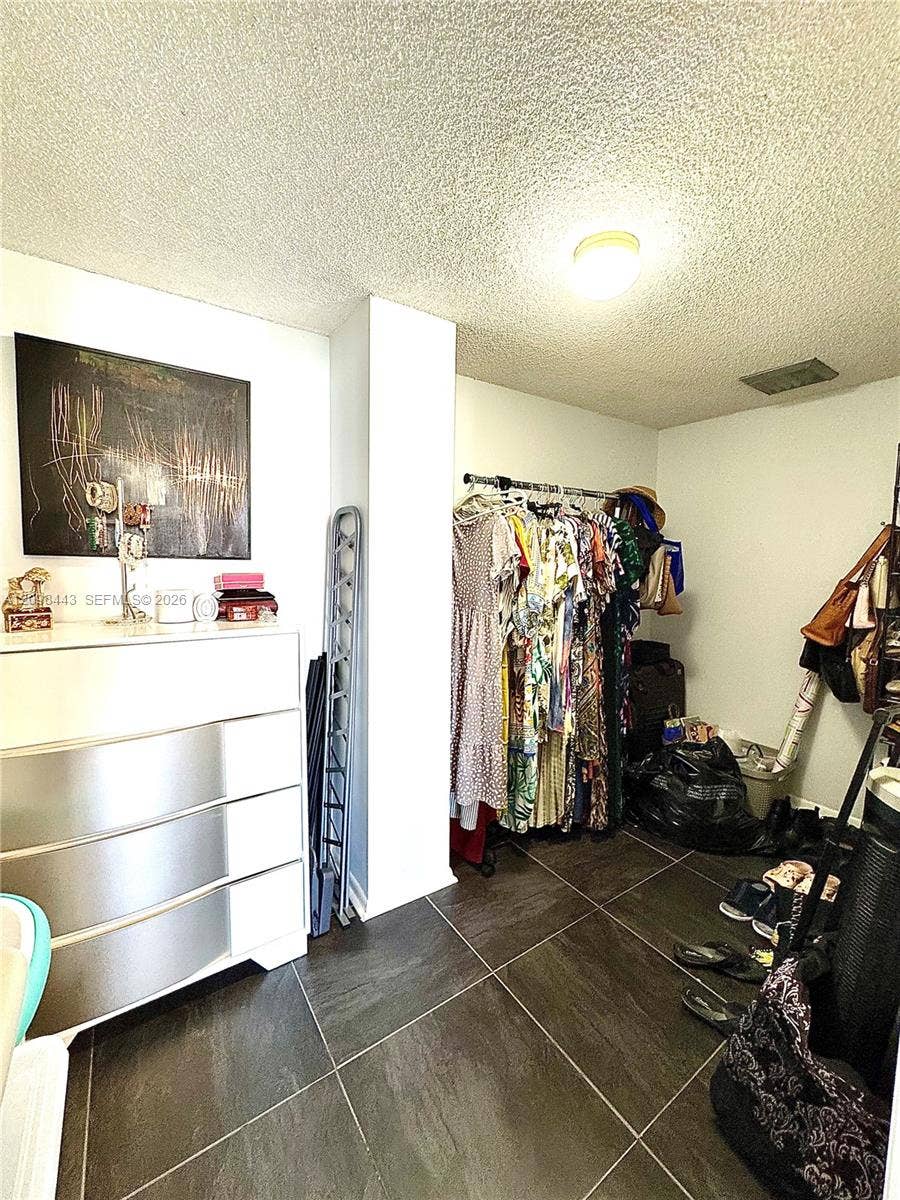 Huge walking closet, could use part of its space for anything else.