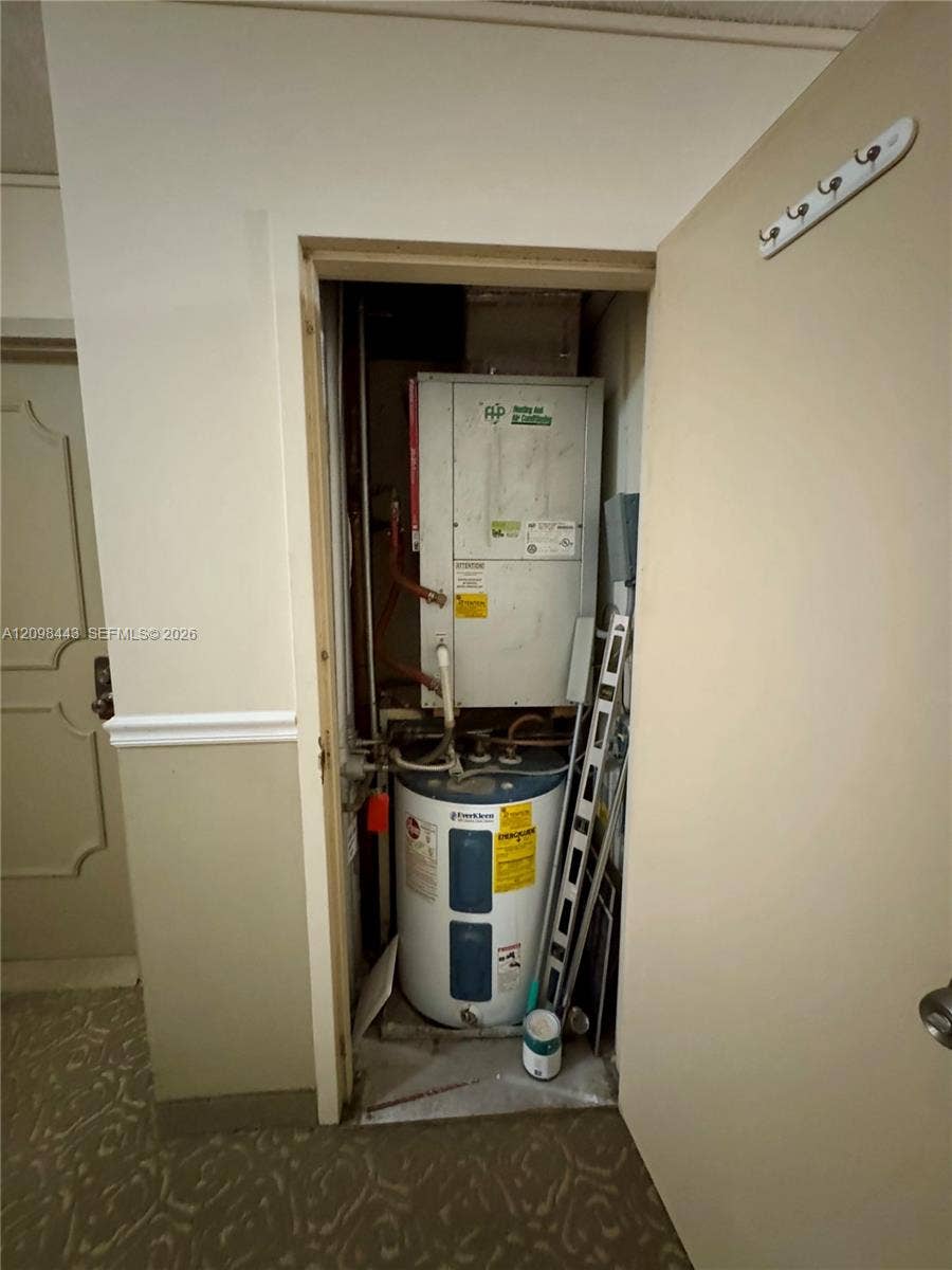 Next door storage for a/c unit and water heater, exterior A/C placement for quiet comfort.