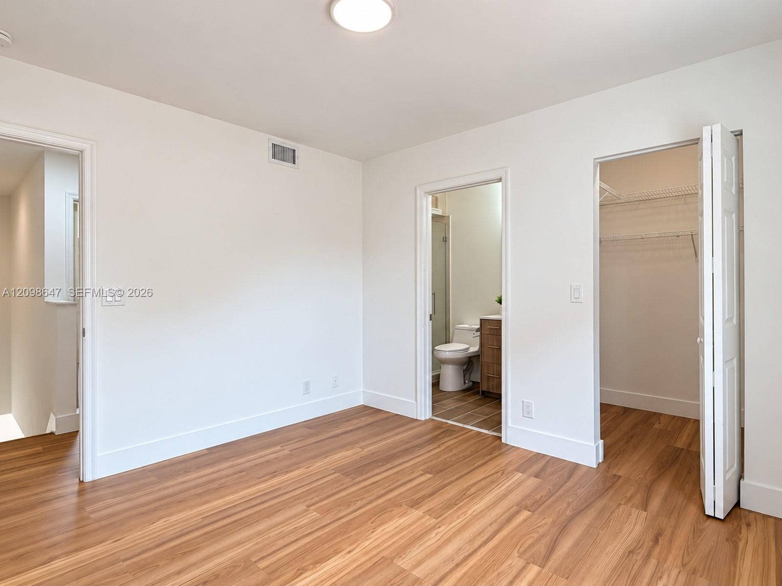 3818 San Simeon Circle, #3818, Weston, Weston, FL 33331 Spacious bedroom completely updated with brand-new waterproof laminate flooring, fresh paint, and bright windows.
