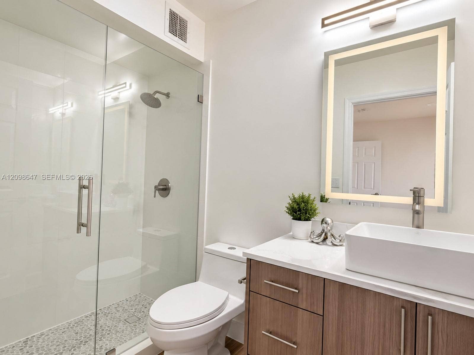 3818 San Simeon Circle, #3818, Weston, Weston, FL 33331 Fully remodeled bathroom with brand-new floor-to-ceiling tile work, modern vanity setup, and new tub.