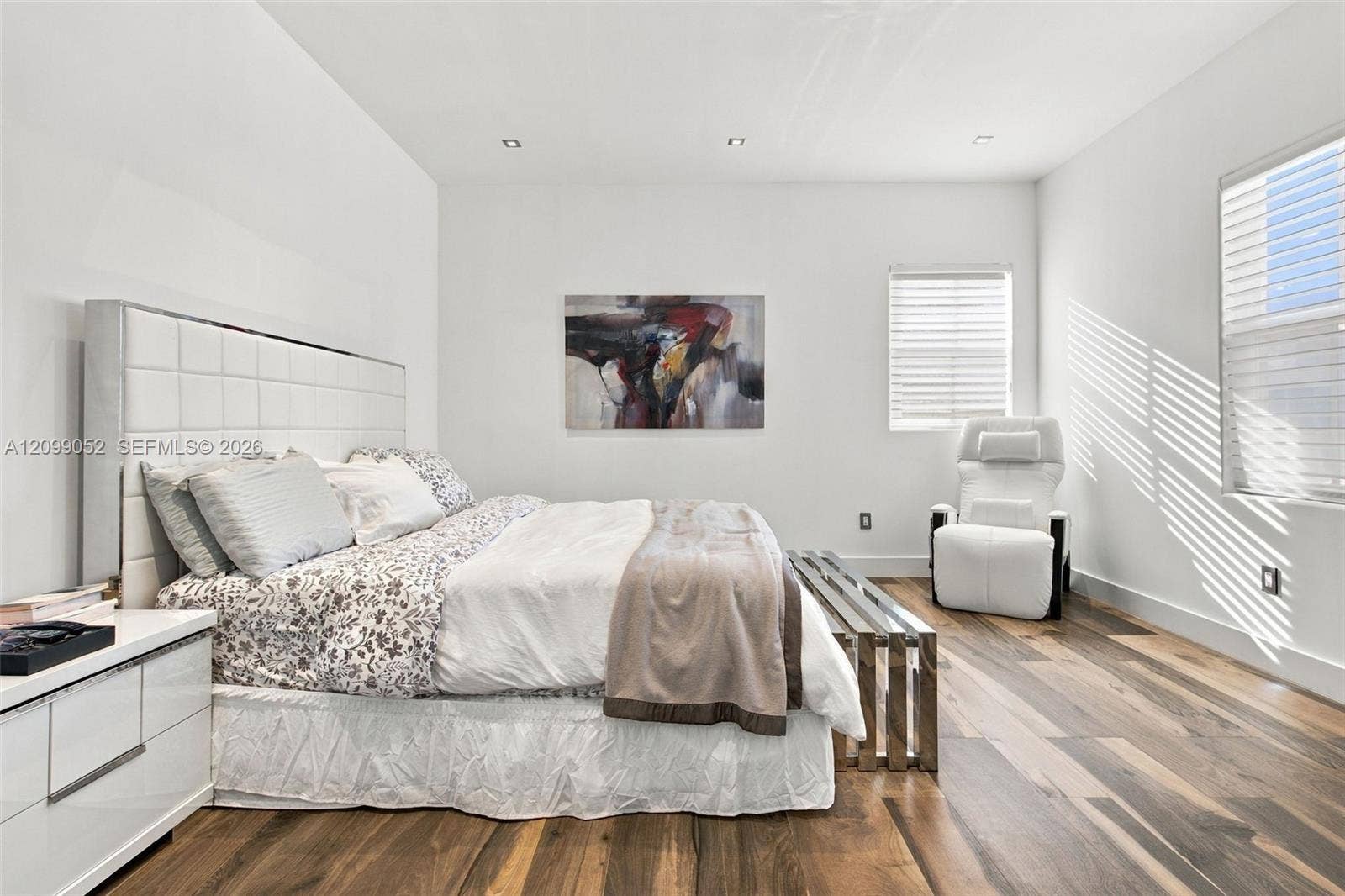 1516 Breakwater Terrace, Hollywood, FL 33019 Wood-finish flooring, recessed lighting, and horizontal window blinds
