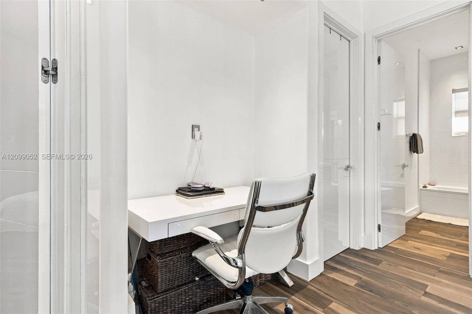 1516 Breakwater Terrace, Hollywood, FL 33019 Built-in white desk with drawer storage, recessed lighting, and wood-finish flooring