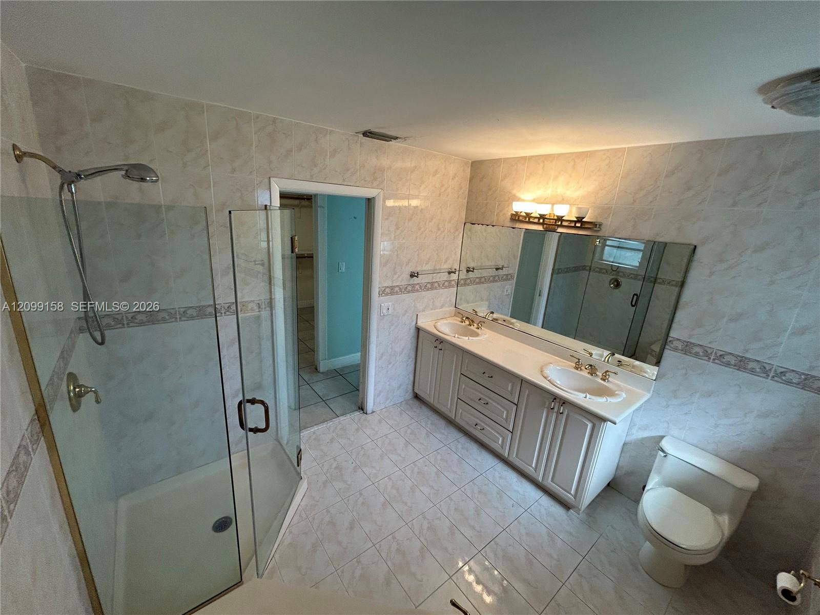 1490 Lenape Drive, Miami Springs, FL 33166 Covered patio featuring a wood-plank ceiling, structural columns, tile flooring, and a screened enclosure surrounding the swimming pool