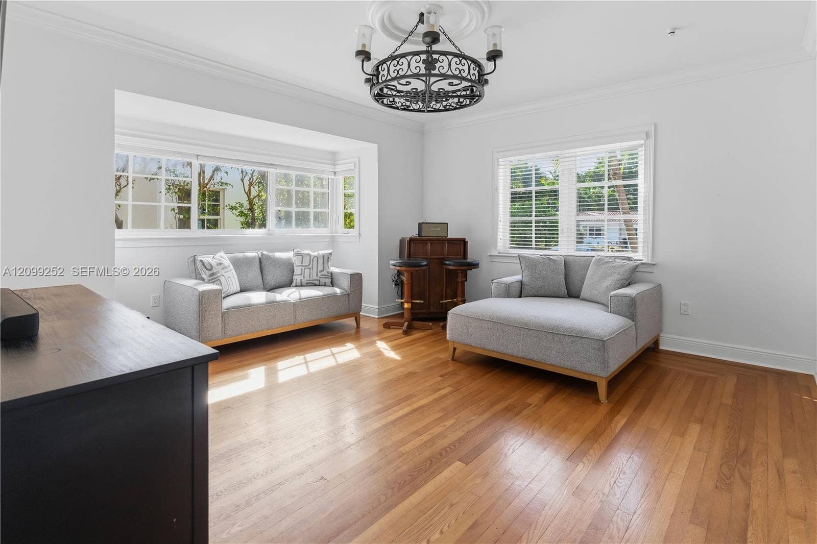 1461 Certosa Avenue, Coral Gables, FL 33146 Spacious family room offering flexible space for dining and entertaining.