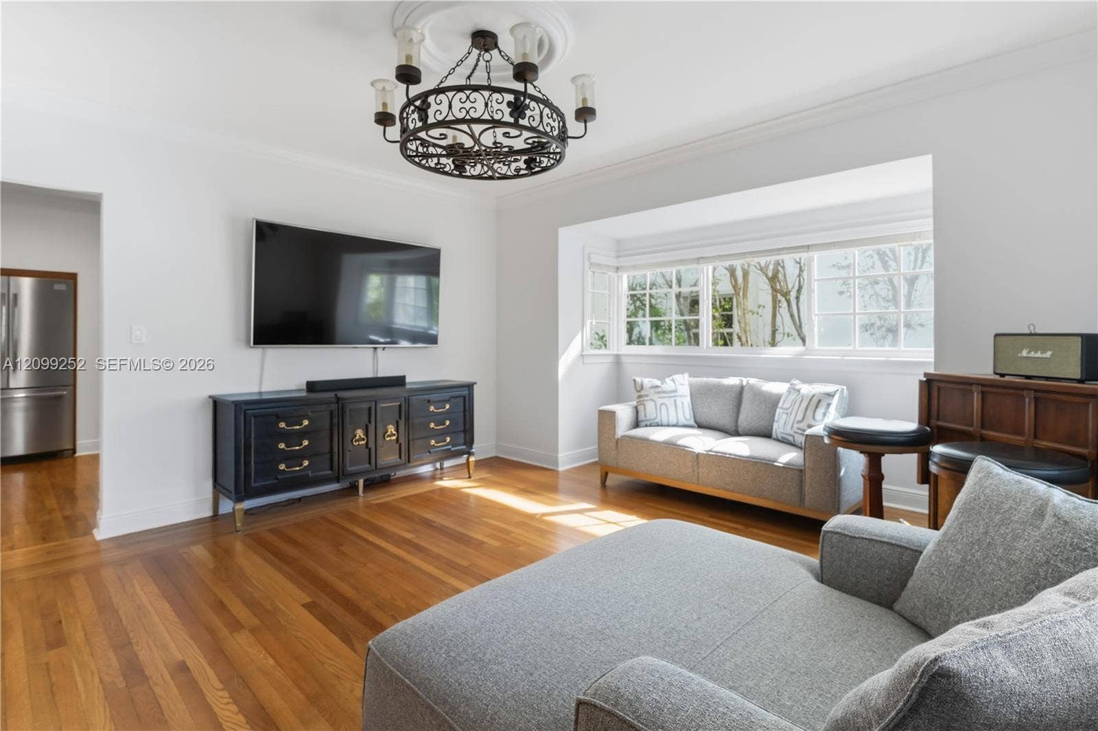 1461 Certosa Avenue, Coral Gables, FL 33146 Spacious family room offering flexible space for dining and entertaining.