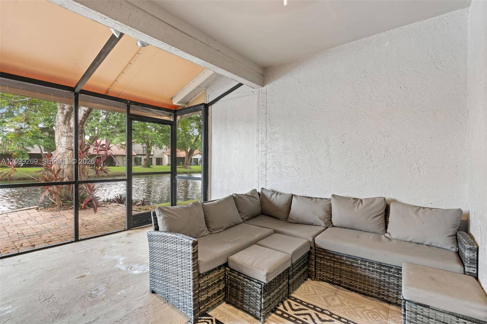 3329 Deer Creek Lake Shore Drive, Deerfield Beach, FL 33442 Patio w/ brand new awning