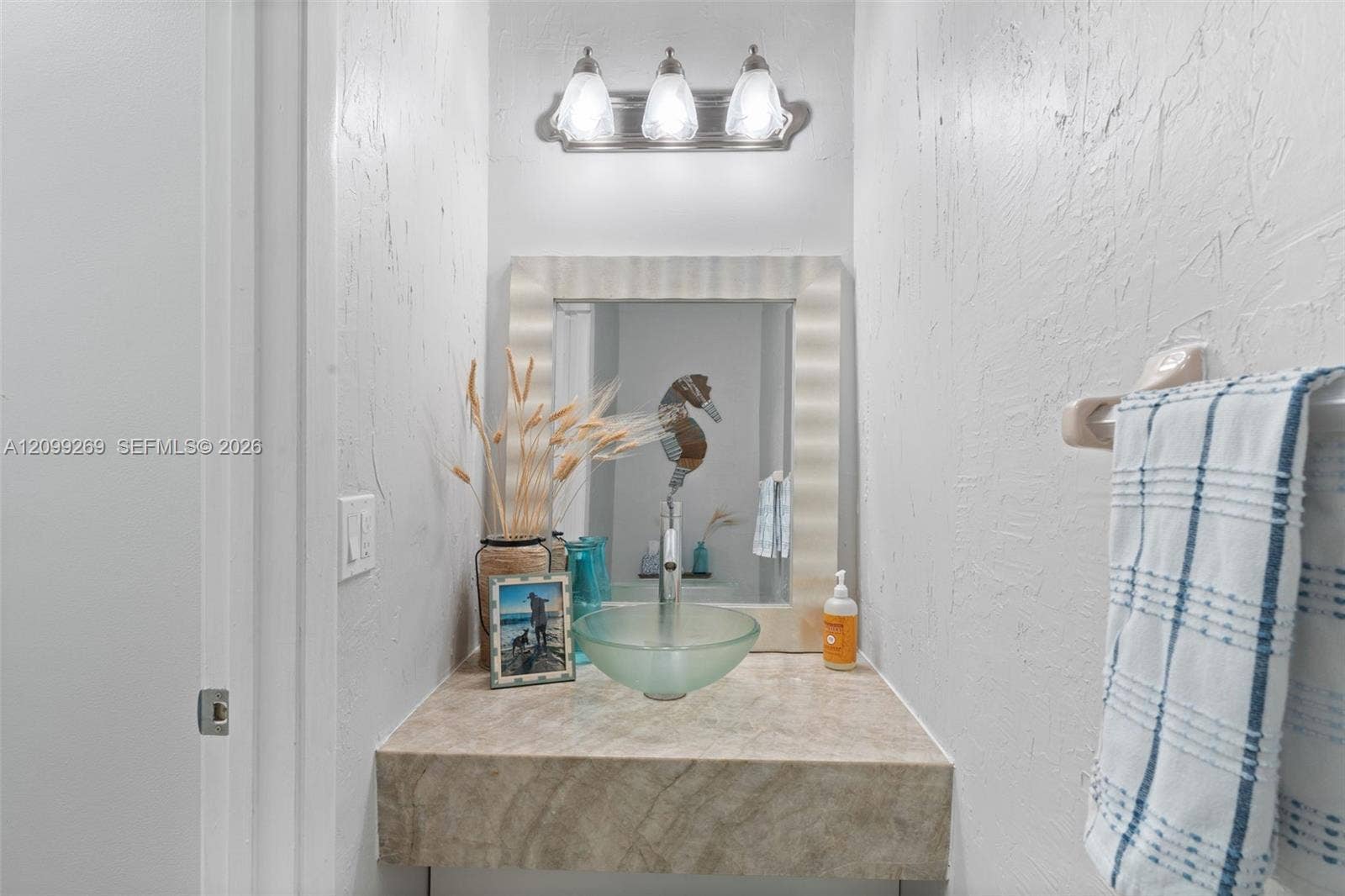 3329 Deer Creek Lake Shore Drive, Deerfield Beach, FL 33442 Half bath downstairs