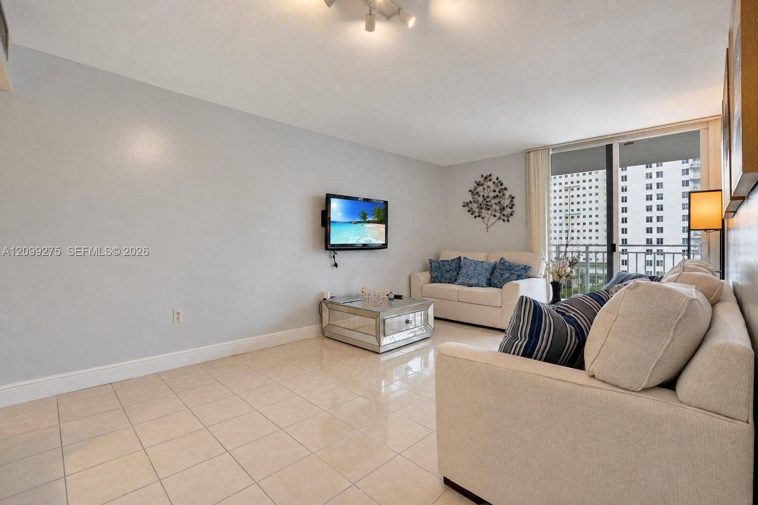 800 N Miami Avenue, #E-902, Miami, Miami, FL 33136 Private balcony offering open views of downtown Miami, landscaped grounds, and sports courtsan ideal spot to enjoy the fresh air.