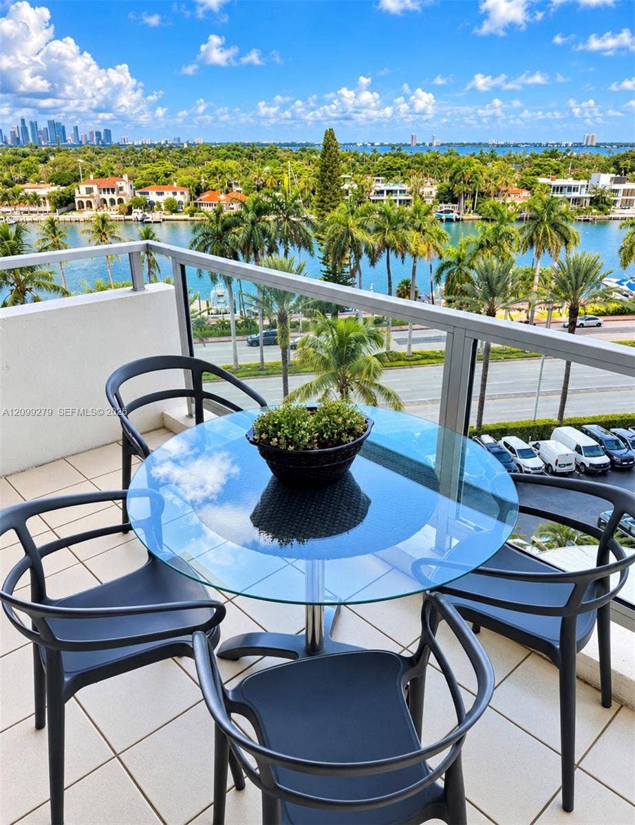 5151 Collins Avenue, #921, Miami Beach, Miami Beach, FL 33140 Private balcony featuring large-format tile flooring and metal-framed glass railings