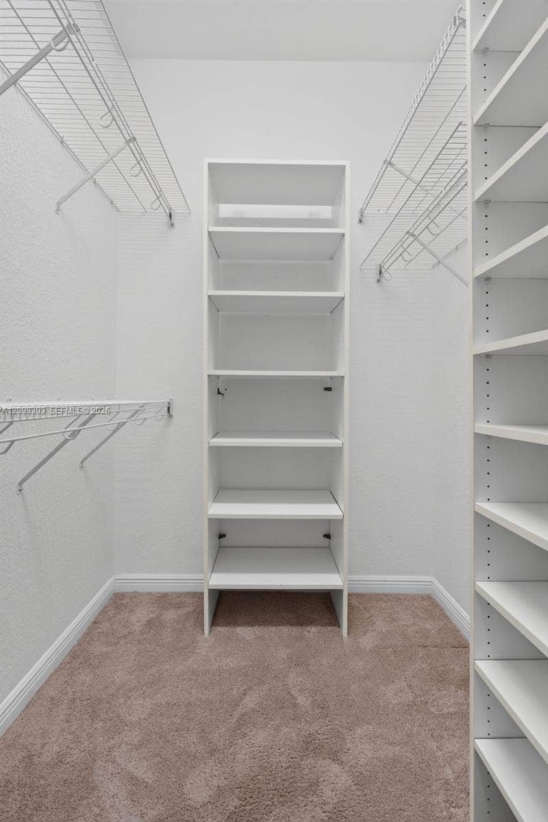 7917 Exeter Boulevard E, #101, Tamarac, FL 33321 Primary Bedroom Walk in Closet