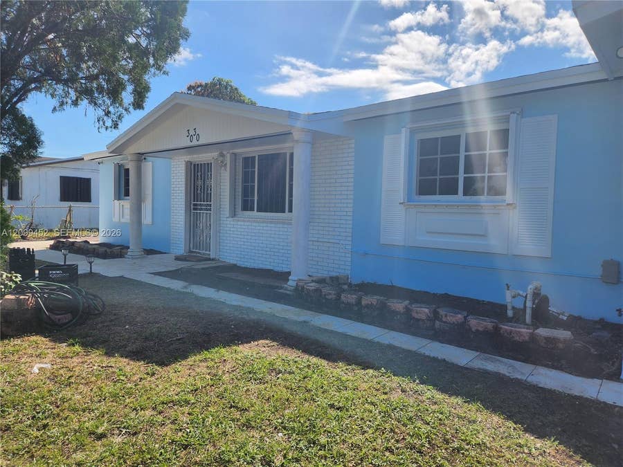 Property photo for 3030 NW 212th Street, Miami Gardens, FL