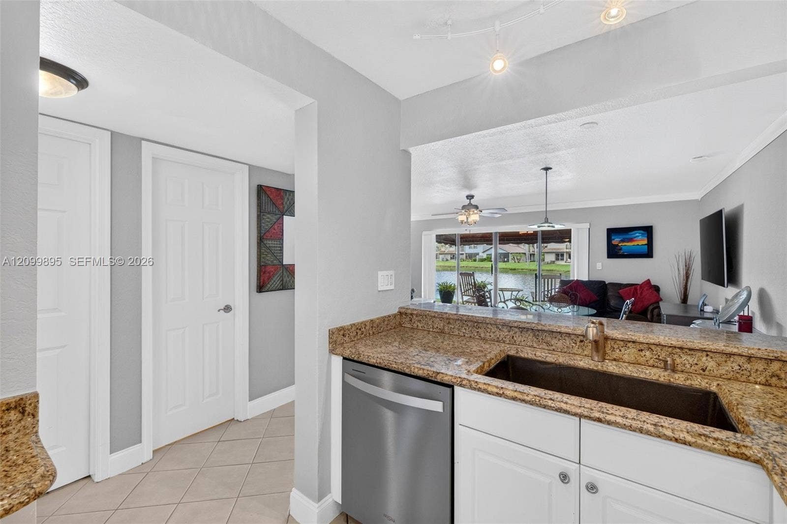 9012 Vineyard Lake Drive, Plantation, FL 33324 Well-equipped kitchen featuring ample cabinetry, a pantry and a convenient breakfast area.
