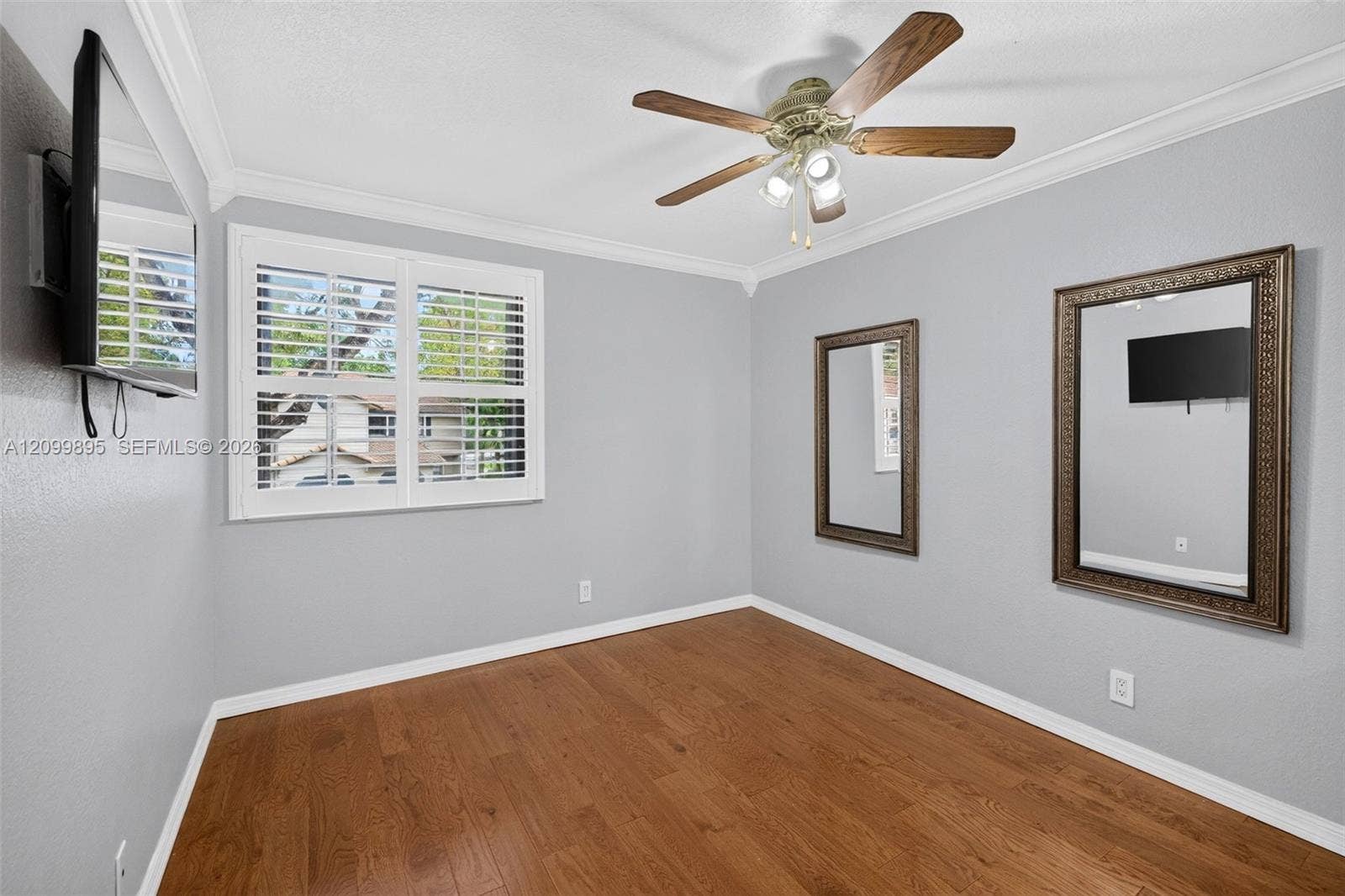 9012 Vineyard Lake Drive, Plantation, FL 33324 Bright and inviting bedroom with ample space for furnishings.