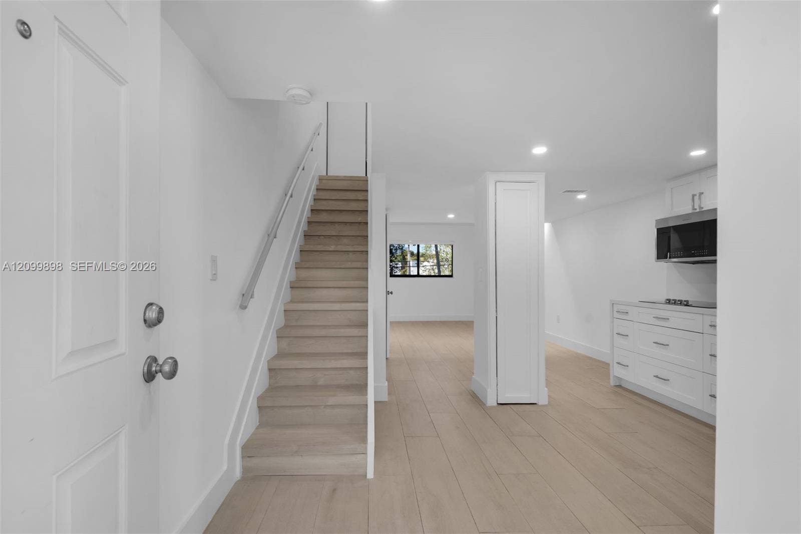 5750 Turin Street, #206, Coral Gables, FL 33146 Look how open and non-claustrophobic this floor-plan is & notice the new kitchen cabinets & Appliances are on the right side and the beautiful tile floors enhance and appear to look like wood that are through-out the whole unit except the bathrooms.