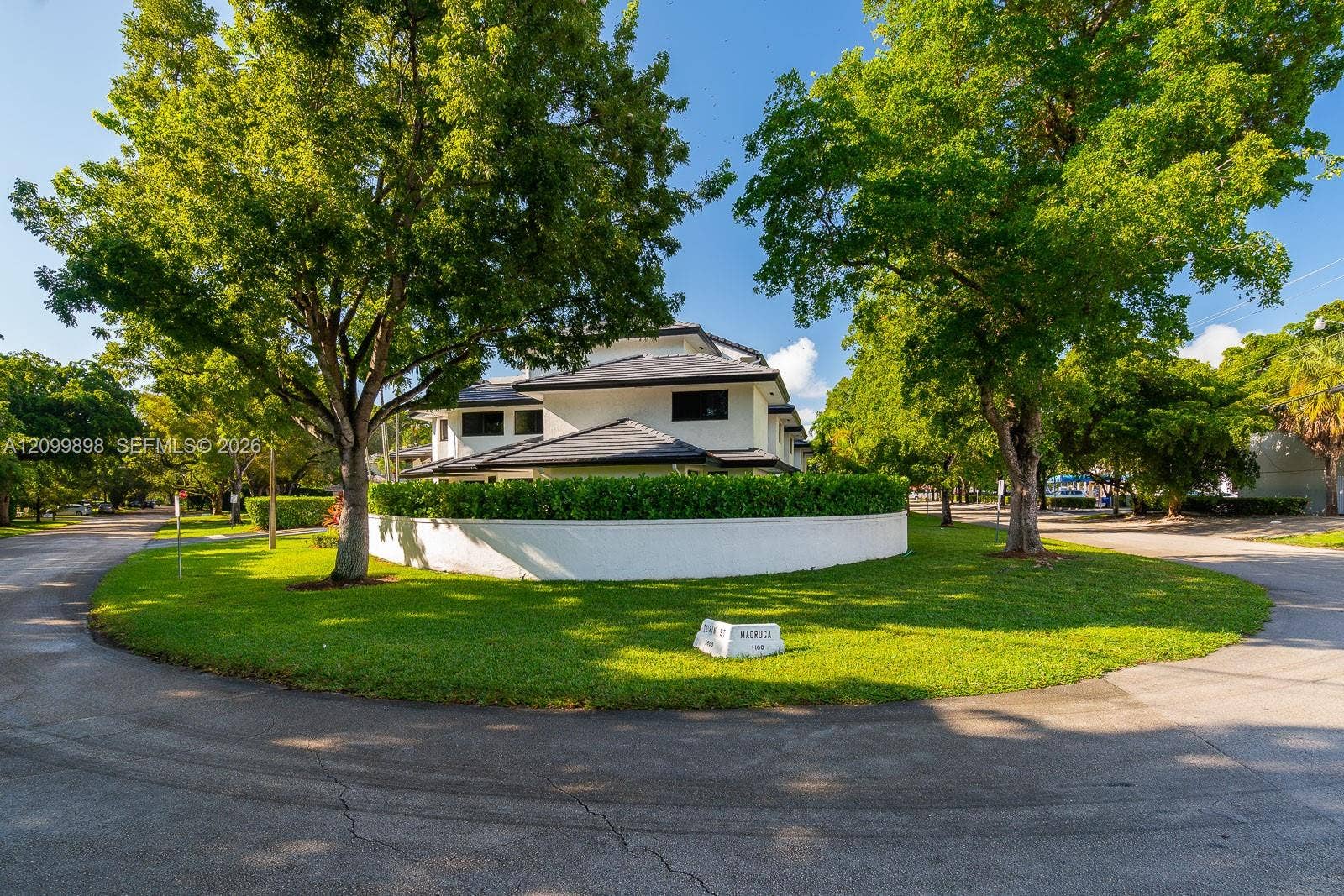 5750 Turin Street, #206, Coral Gables, FL 33146 To the right is Madruga St and to the left is Turin Street which has the entrance to the buildings parking Lot! This is a 2 story, 2Bdrm/2.5 Bath Townhouse with over over 990 SF!