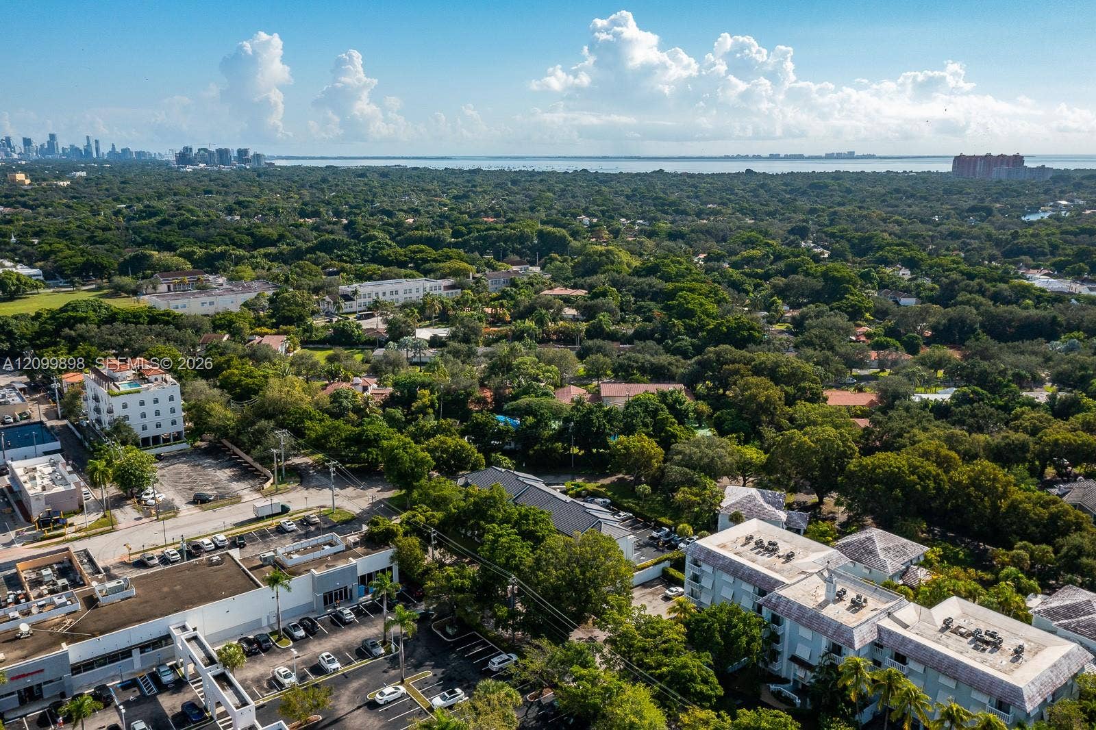 5750 Turin Street, #206, Coral Gables, FL 33146 Once again, looking Easterly and seeing Downtown Miami, the Brickell area and also Downtown Coconut Grove and beyond Biscayne Bay you can see the Key Biscayne Island where you have Crandon Beach & my favorite, Cape Florida State Park, where the oldest light house is situated in Miami-Dade County, both are BEACH sites that have the cleanest & nicest beaches, South of Miami Beach!!