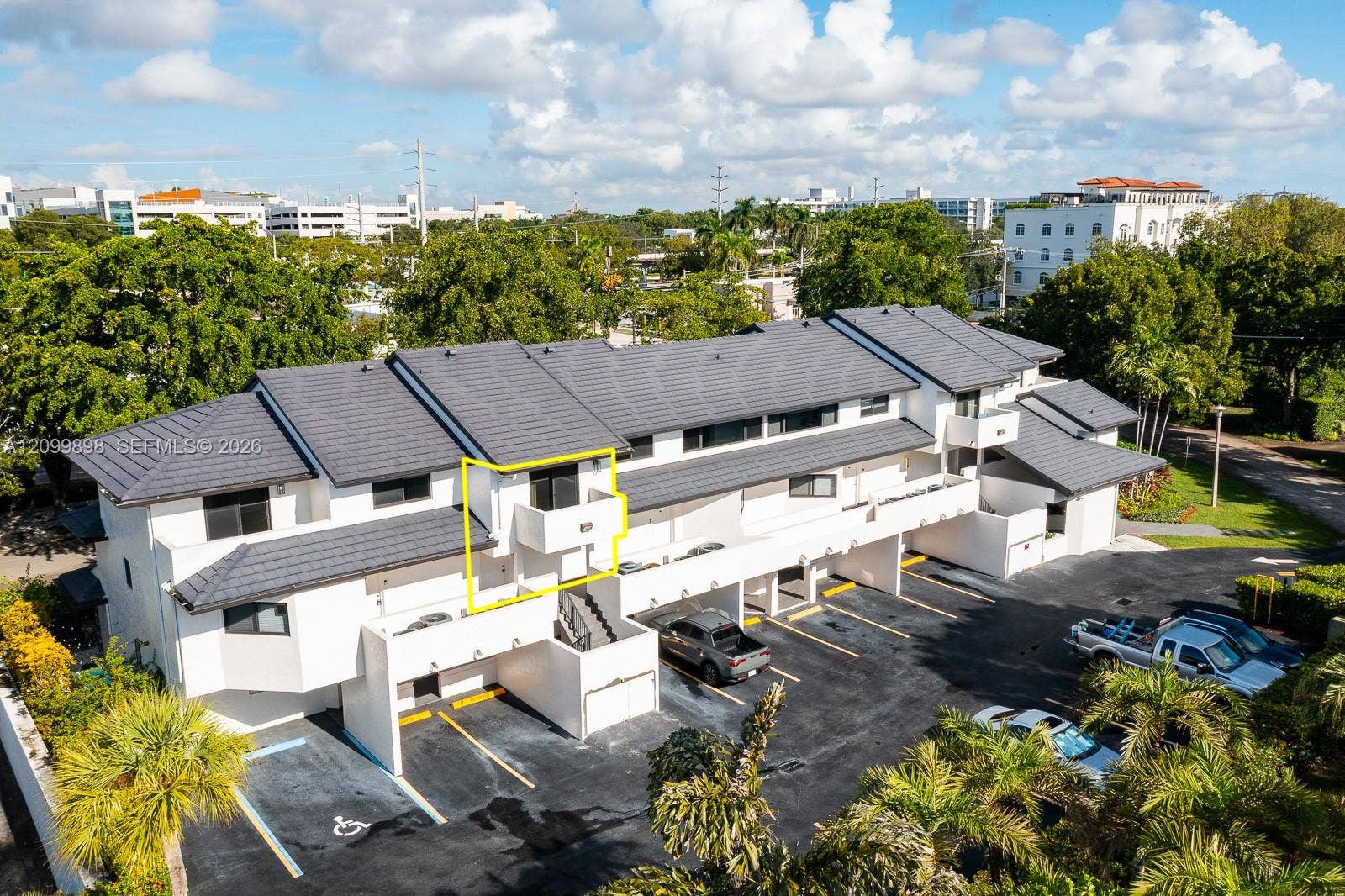 5750 Turin Street, #206, Coral Gables, FL 33146 What an IMPRESSIVE BUILDING! Notice the yellow lines high-lite where unit 206 is located in the building! Notice that only 1 other unit in the building has a balcony like unit 206's! Beyond the roof line one can make out many of the buildings that are on the University of Miami's campus! That is how close you are to campus & numerous restaurant/shopping possibilities!