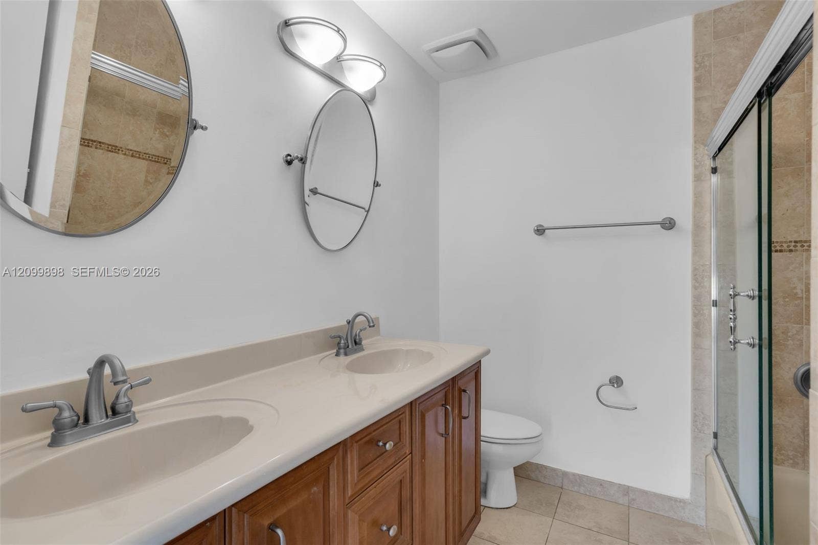 5750 Turin Street, #206, Coral Gables, FL 33146 The Primary Bathroom has an en-suite Bathroom that has dbl vanity sinks, new mirrors and lights.