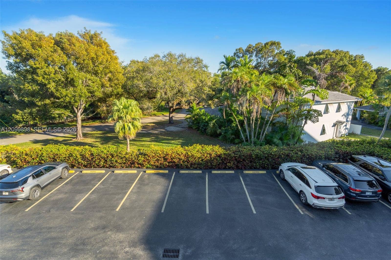 5750 Turin Street, #206, Coral Gables, FL 33146 Notice how well laid out the parking lot is and how well the grounds are kept by the Association. There are several dedicated guest parking spaces located to the right side of this picture and almost in front of this unit 206!