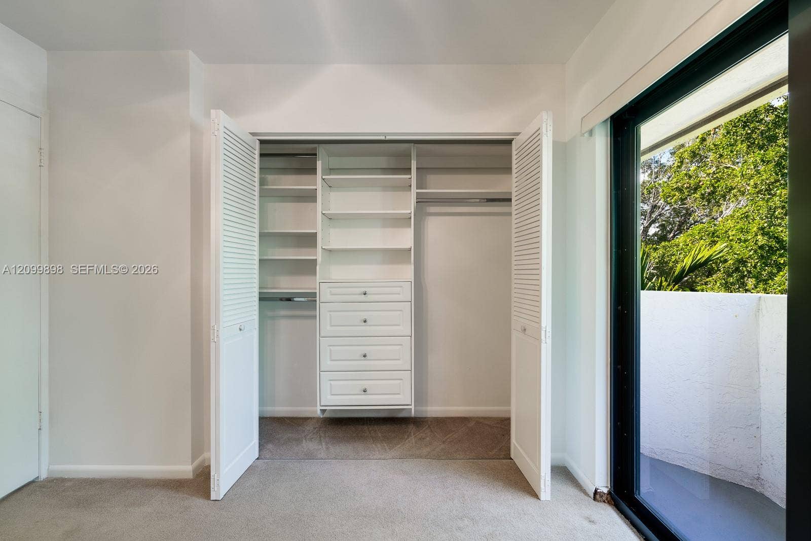 5750 Turin Street, #206, Coral Gables, FL 33146 The North Bedroom has nice built-in closet organizers in the closet with new brushed nickel knobs!