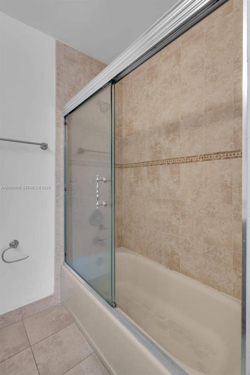 5750 Turin Street, #206, Coral Gables, FL 33146 The 2nd Bedroom en-suite Bathroom has a nice tub and nice glass doors.