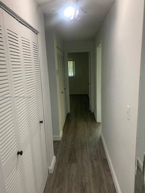 Hallway to bedrooms and laundry