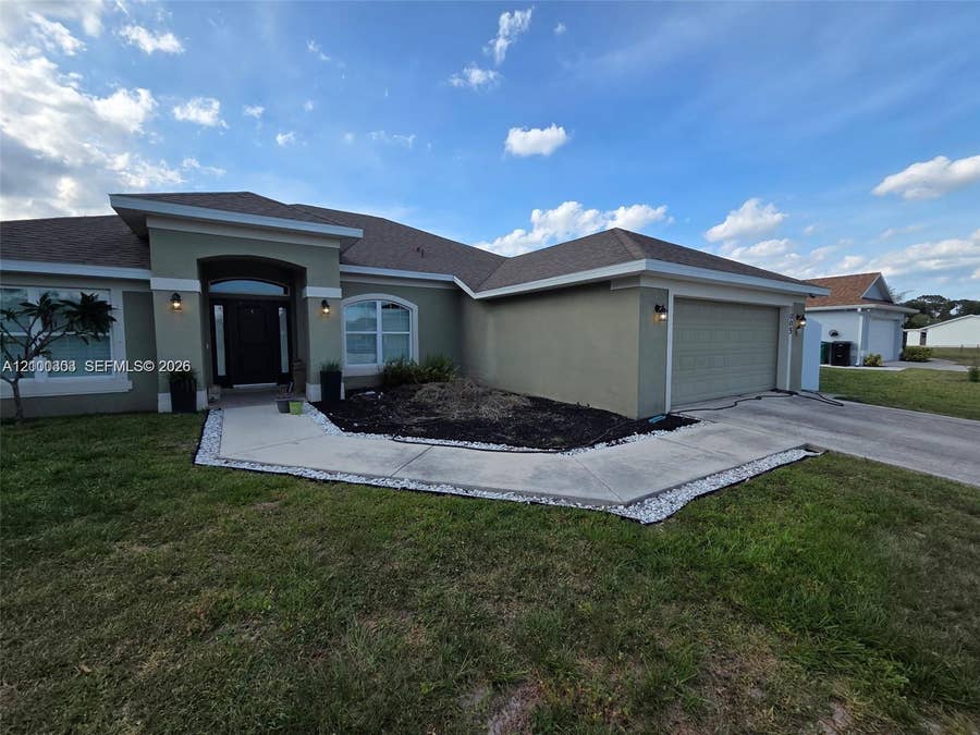 Property photo for 1005 SW Bay State Road, Port St Lucie, FL