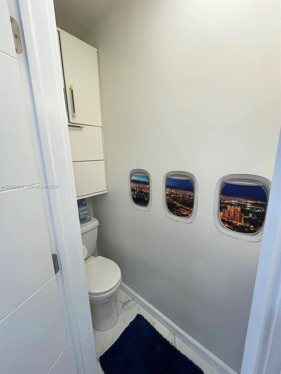 9065 Thunderbird Drive, Coral Springs, FL 33065 1/2 Bathroom
