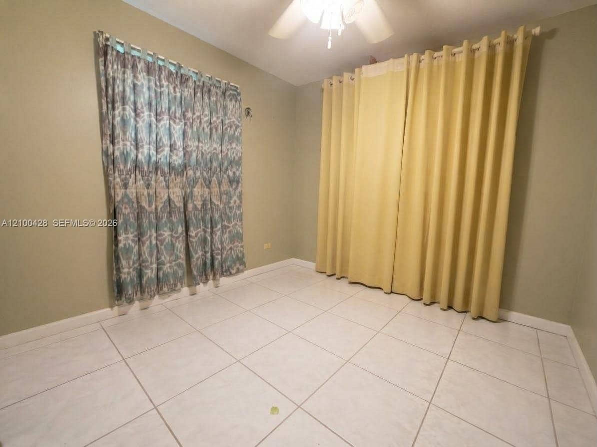 6641 SW 5th Street, Pembroke Pines, FL 33023 Second Bedroom AI Staged Empty