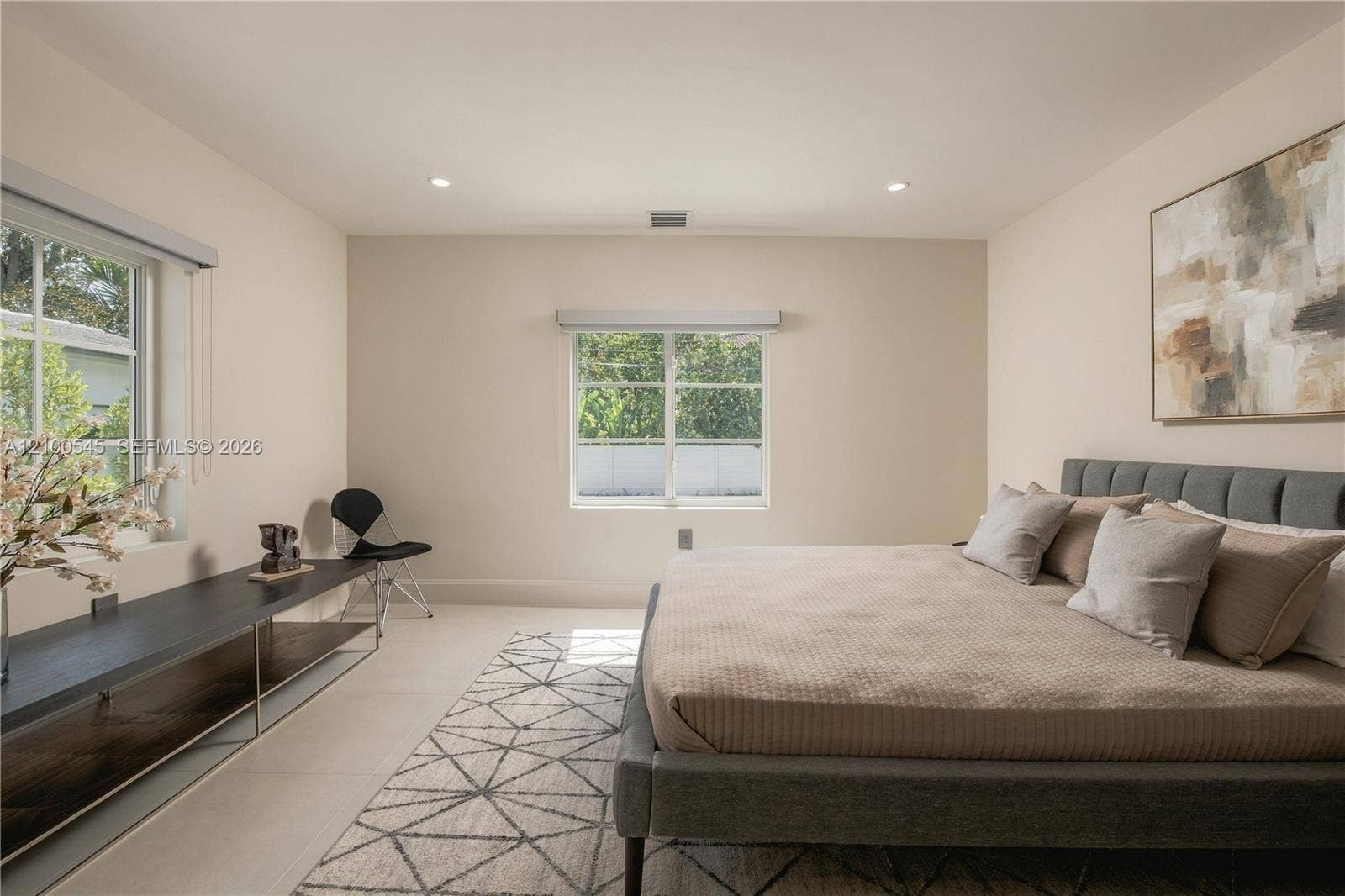 1042 NE 95th Street, Miami Shores, FL 33138 Spacious Bedroom 2 with pool view.