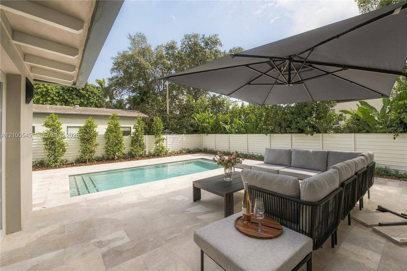1042 NE 95th Street, Miami Shores, FL 33138 Elevated deck with wrap-out stairs to new pool (12x24)
