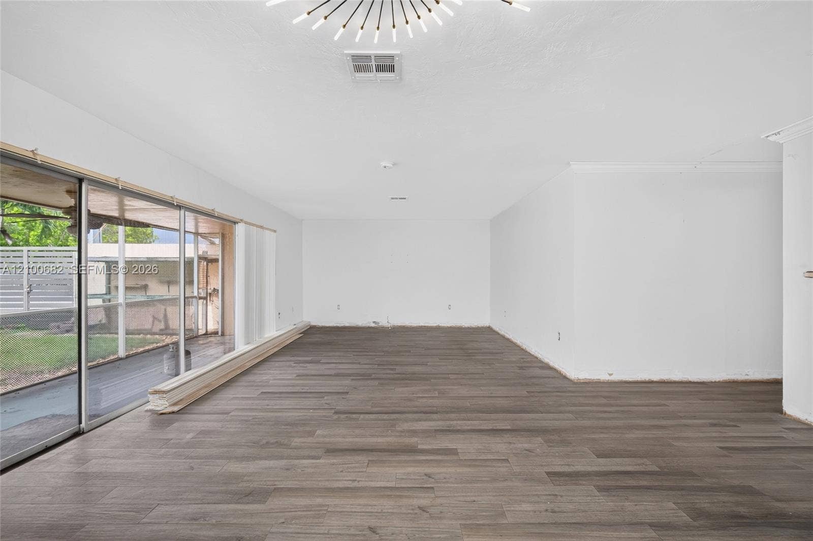 8402 SW 102nd Court, Miami, FL 33173 Spacious interior with lots of sliding glass doors leading to the covered patio*