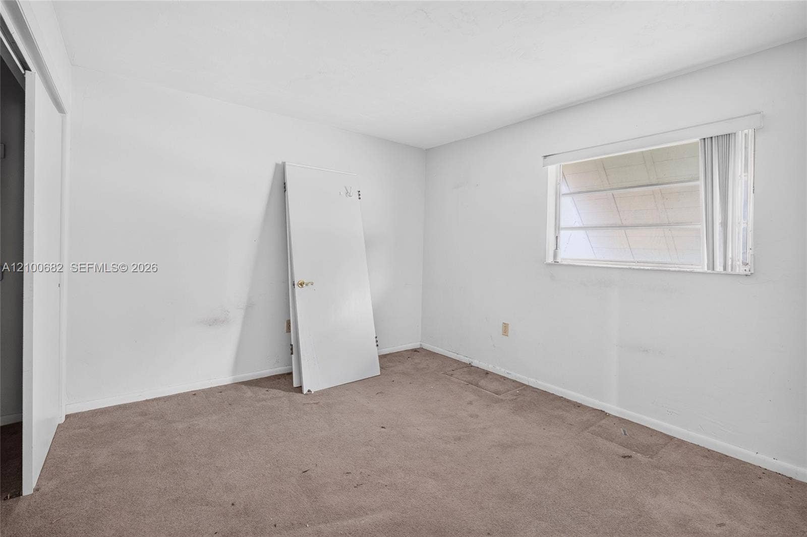 8402 SW 102nd Court, Miami, FL 33173 One of the bedrooms where the new flooring has not been installed *
