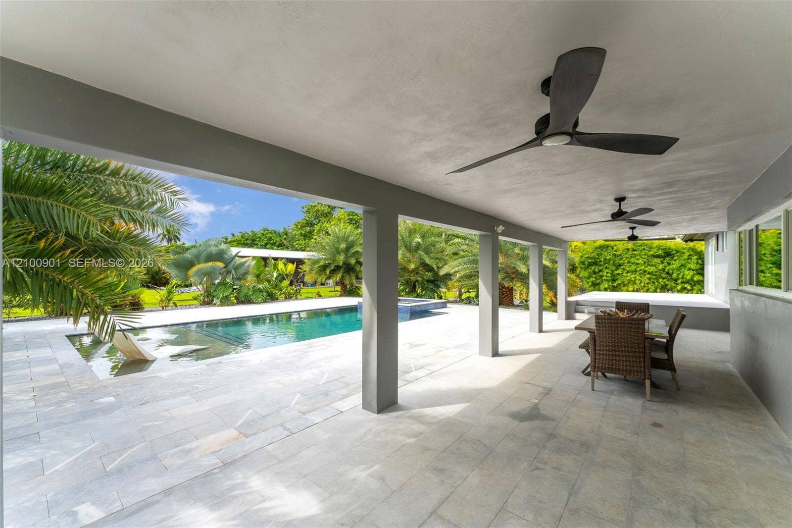 RESORT LEVEL!!! SMART SALT WATER POOL SYSTEM THATS HEATED.IDEAL FOR THOSE OF US THAT COLOR!..WITH WATERFALL FEATURE, HOT TUB, TANING LEDGE WITH LOUNGERS.THIS IS A BEAUTY.