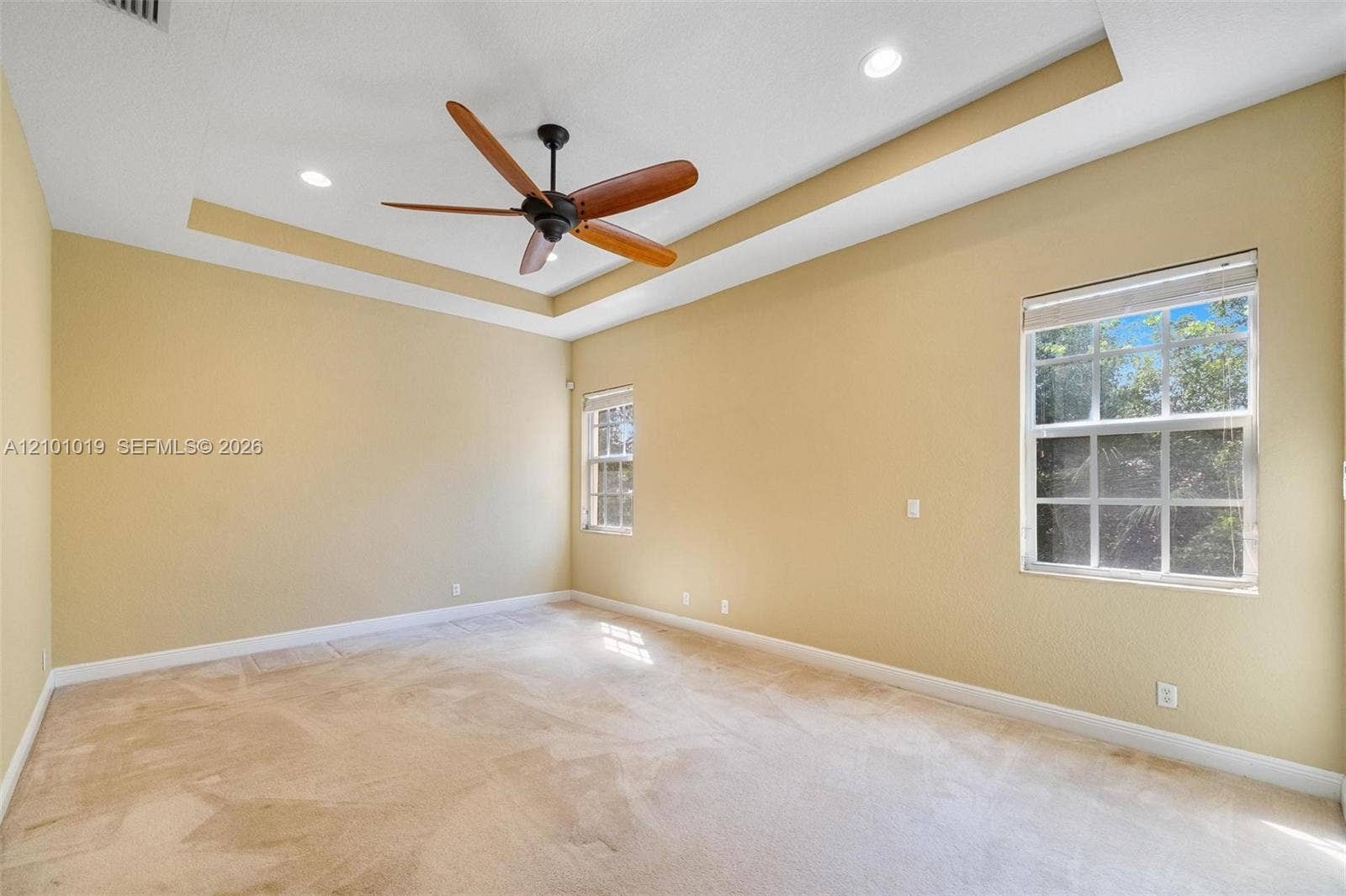 Main bedroom with tray ceiling