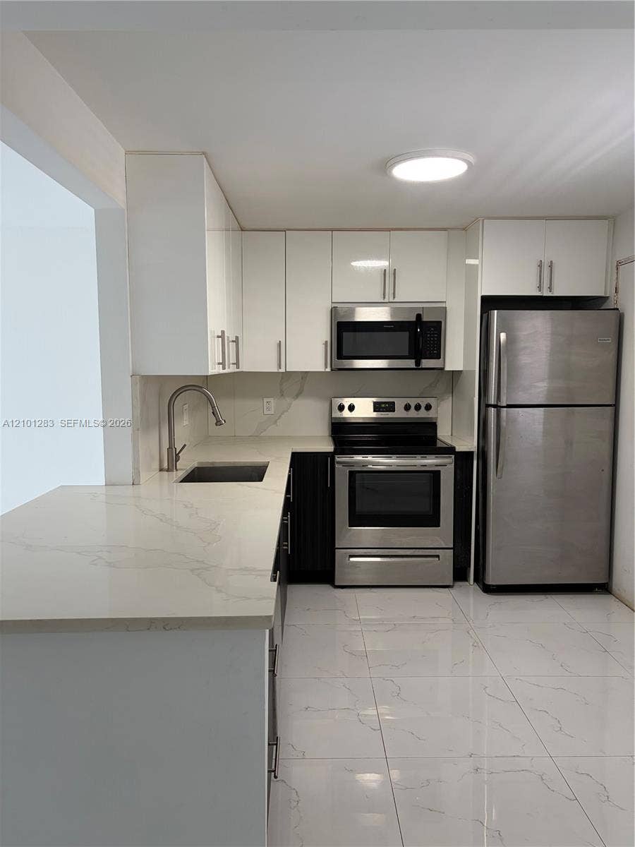 Property photo for 1401 NE 191st Street, #D201, Miami, FL