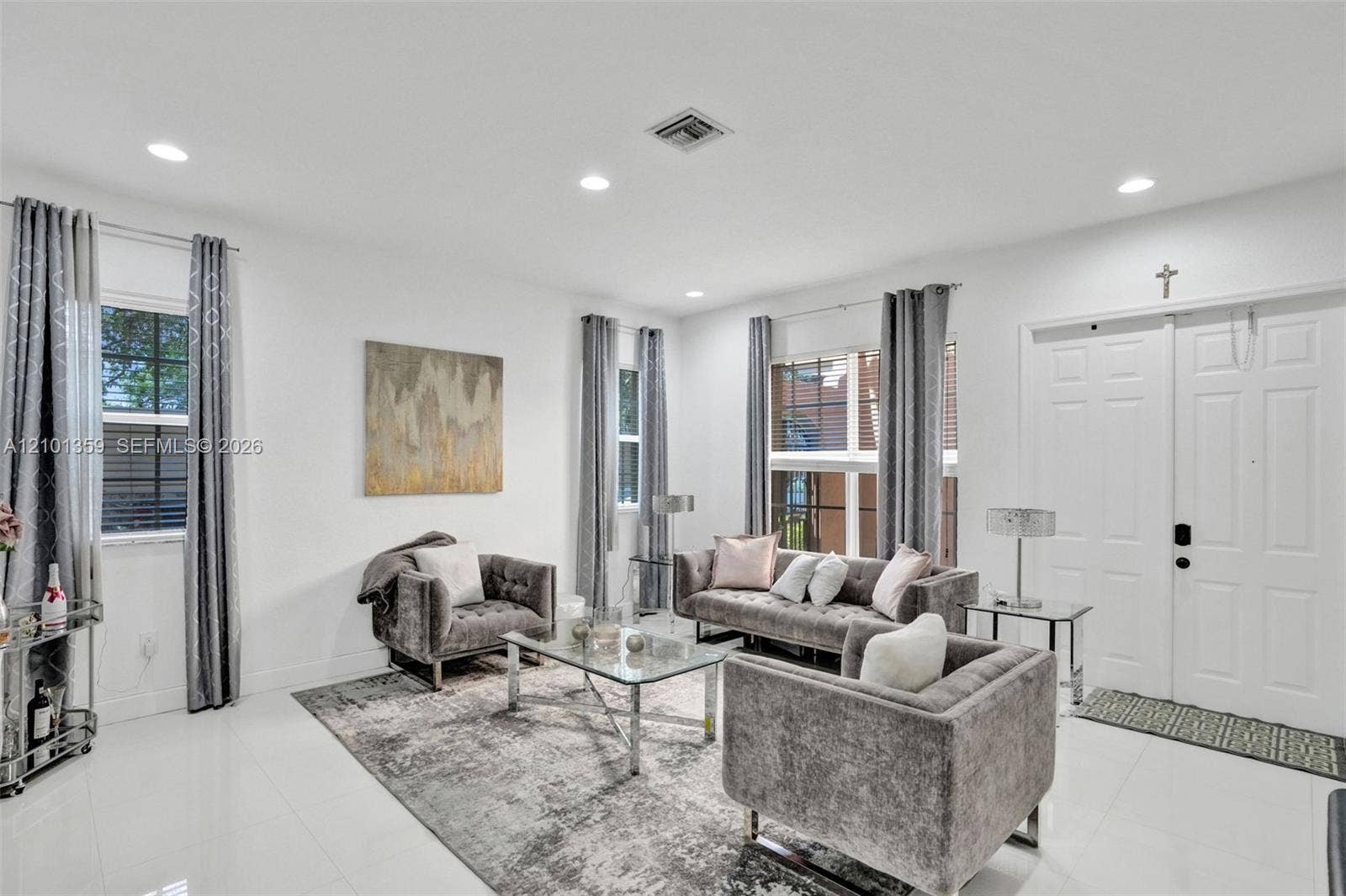 859 SW 147th Terrace, #0, Pembroke Pines, FL 33027 Living area featuring large-format tile flooring, recessed lighting, and double-entry doors