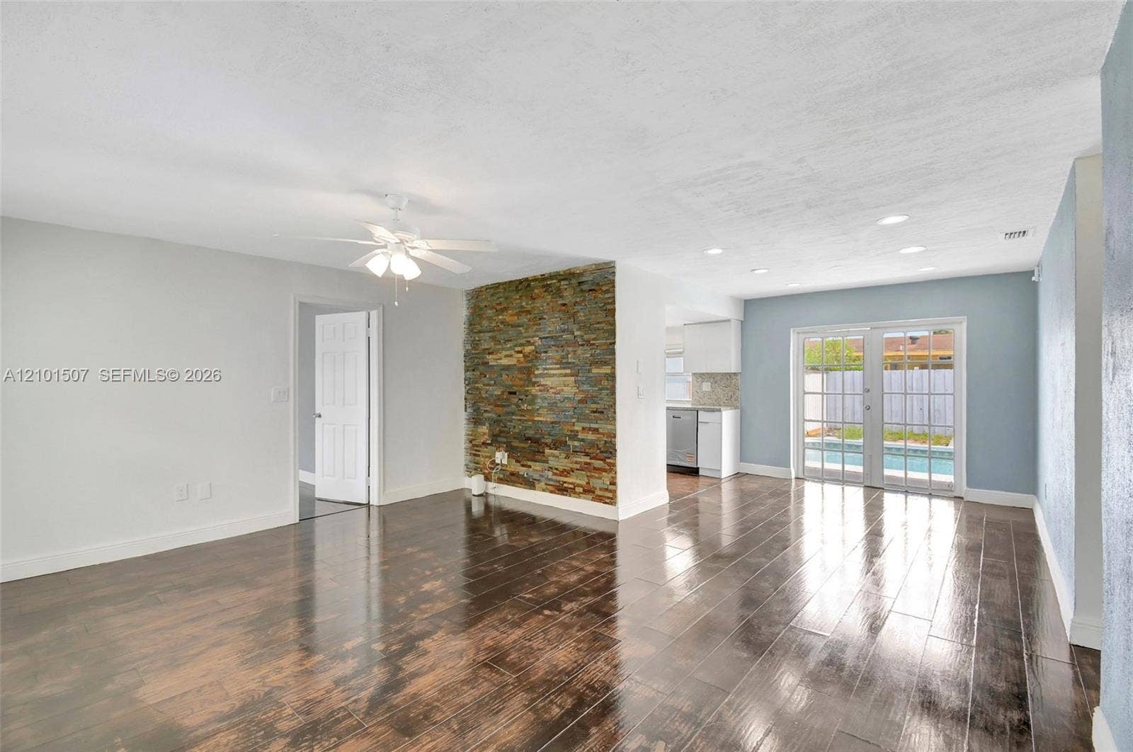 8960 Sunset Strip, Sunrise, FL 33322 Living room with accent wall