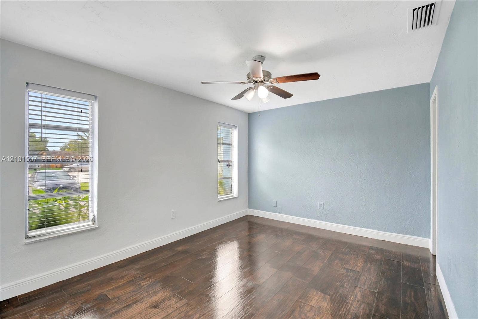 8960 Sunset Strip, Sunrise, FL 33322 Bedroom with blue walls