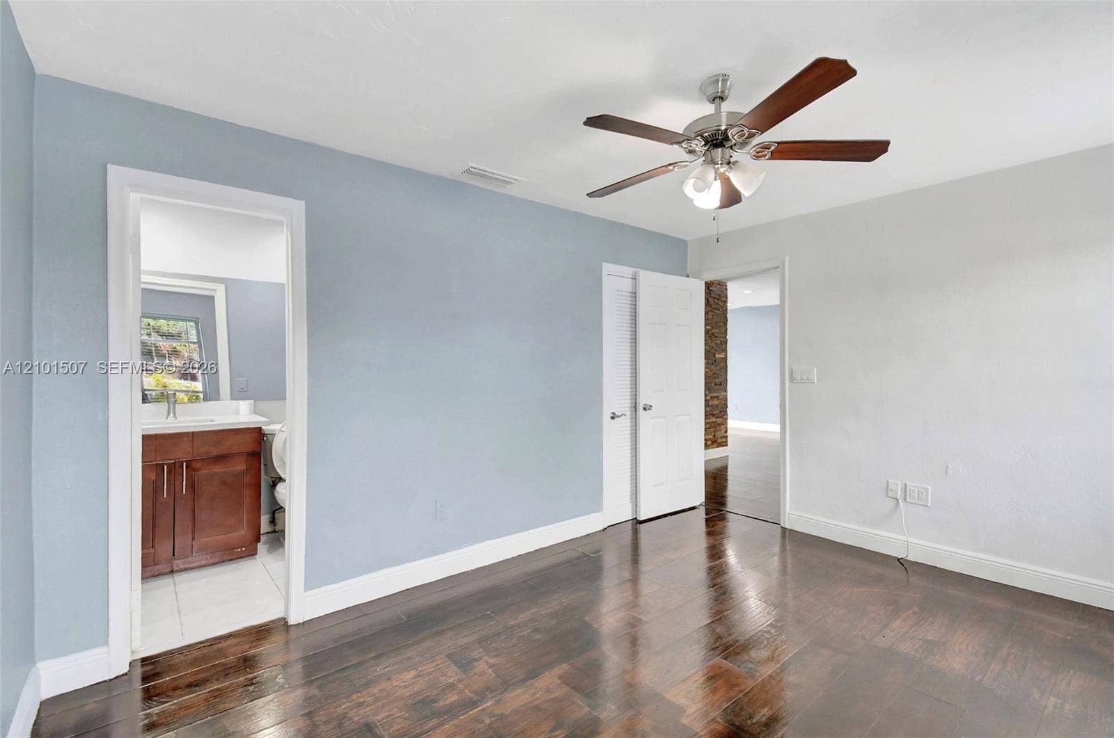 8960 Sunset Strip, Sunrise, FL 33322 Same blue-wall bedroom - bathroom access