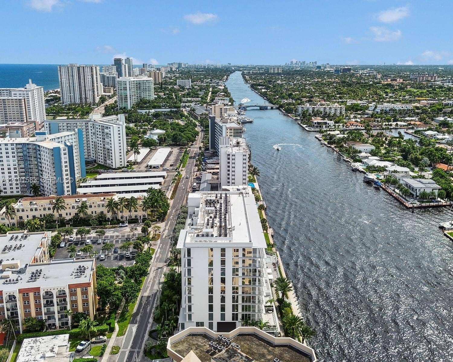 407 N Riverside Drive, #604, Pompano Beach, Pompano Beach, FL 33062 Aerial perspective of coastal landscape featuring deep-water waterway access, proximity to oceanfront high-rises, and established waterfront urban infrastructure