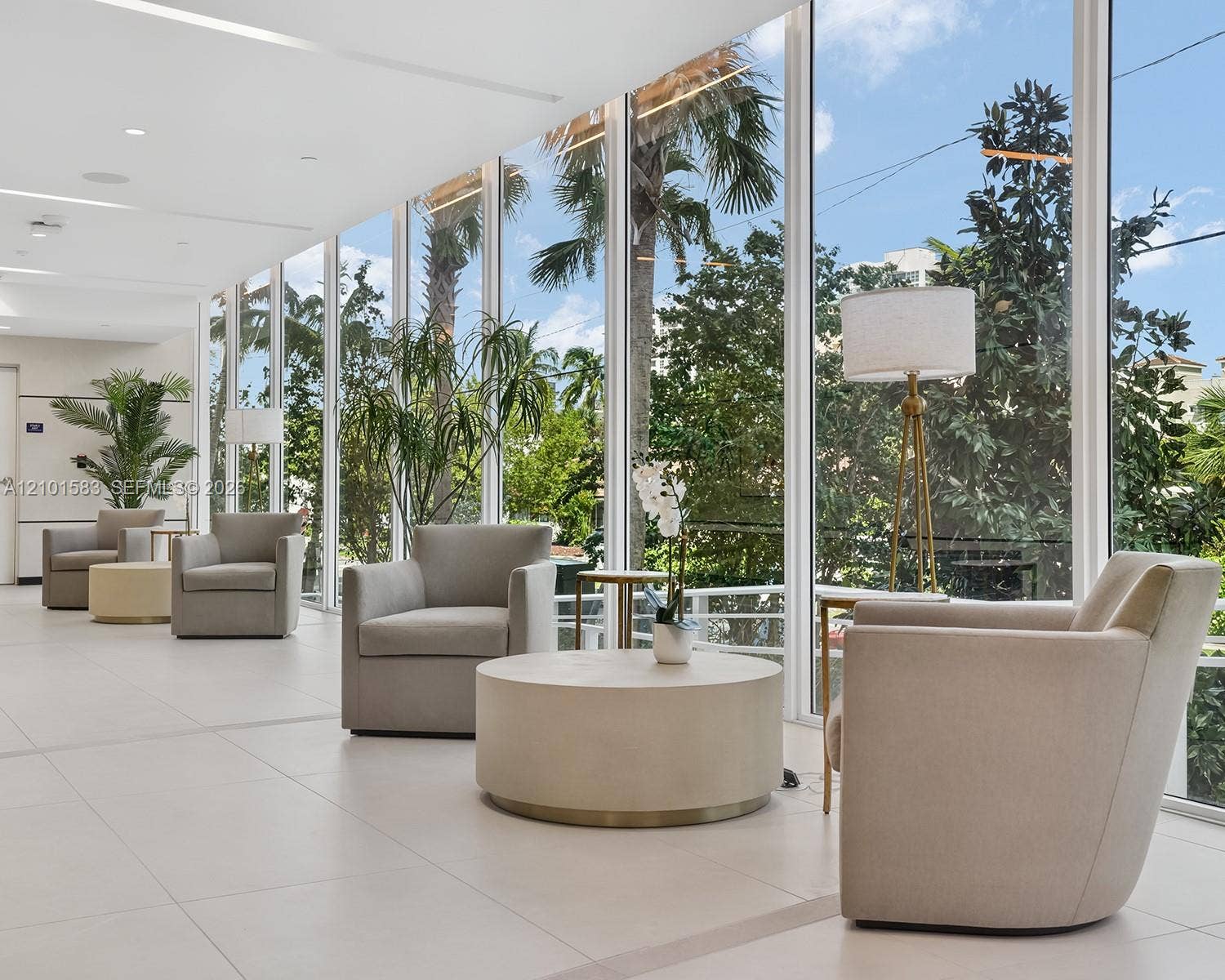 407 N Riverside Drive, #604, Pompano Beach, Pompano Beach, FL 33062 Floor-to-ceiling glass windows, recessed ceiling lighting, and large-format porcelain tile flooring